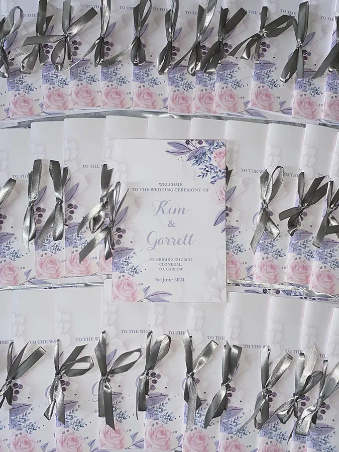 Full Folded Mass Booklets Tied in Silver Ribbon